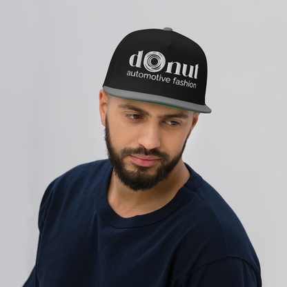 Flat bill snapback hat with embroidered logo